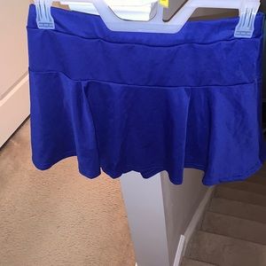 A blue skirt with shorts underneath
